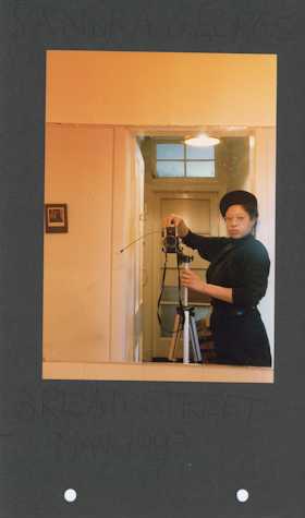 photographic self portrait of the artist sandra George in a mirror
